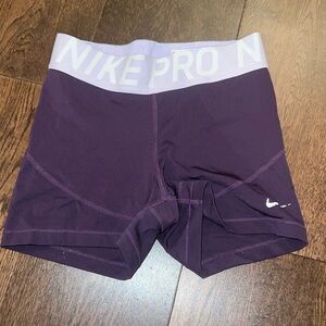 Purple nike pros